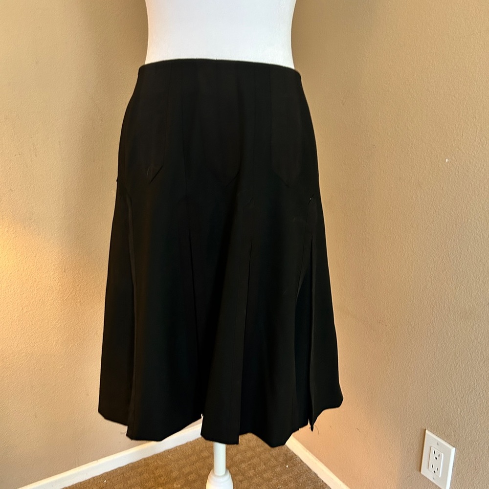 The Limited, black knee length pleated skirt, heavy material with liner, size 2